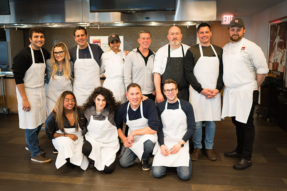 Elvis Duran and his iHeart Radio team make sushi at ICE.
