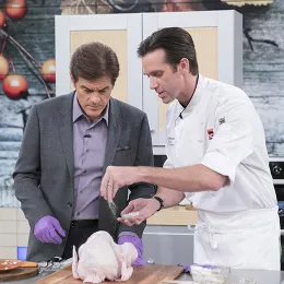 ICE Chef James Briscione demonstrates turkey cooking techniques to Dr. Oz