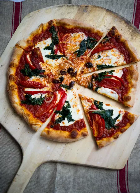 Pizza with fresh mozzarella, basil and tomato