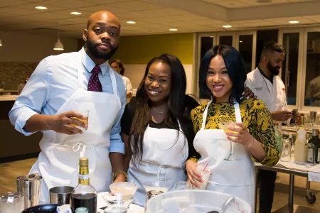 Guests making cocktails in the Mixology Center at the Institute of Culinary Education