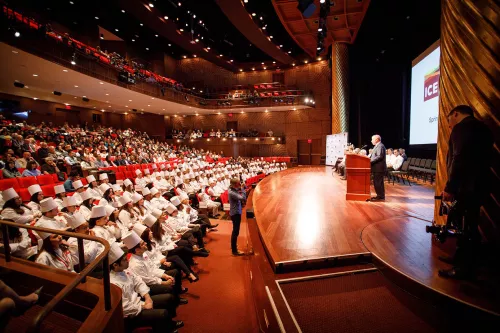 Students celebrate their graduation ceremony from the Institute of Culinary Education