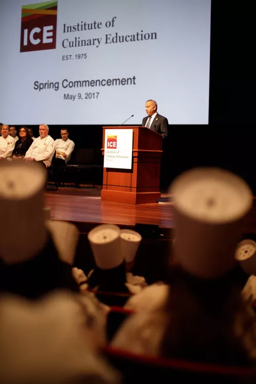 ICE President Rick Smilow speaks to students at their graduation ceremony from the Institute of Culinary Education