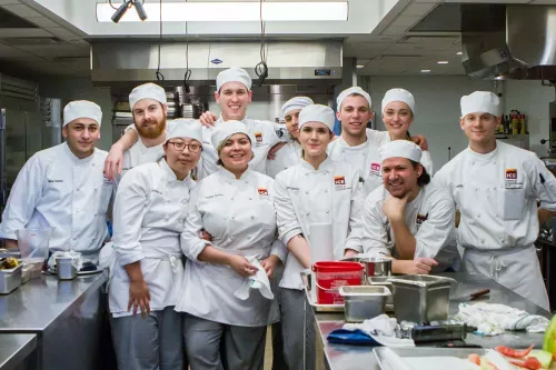 A group of culinary arts students in class at the Institute of Culinary Education