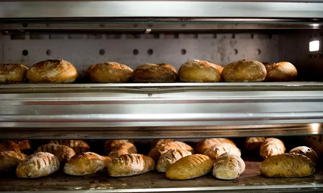 Bread bakes in a deck oven in the pastry kitchens at the Institute of Culinary Education