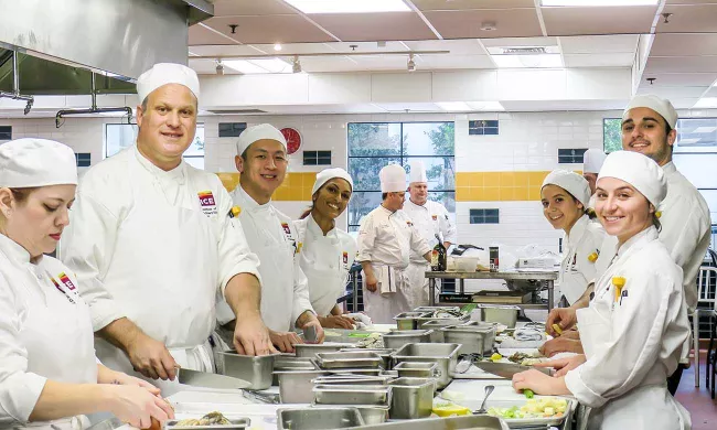 Culinary school students in the kitchen at the Institute of Culinary Education Los Angeles