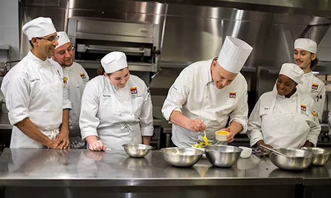 Plant-Based Culinary Arts Lead Chef Elliott Prag instructs students at ICE