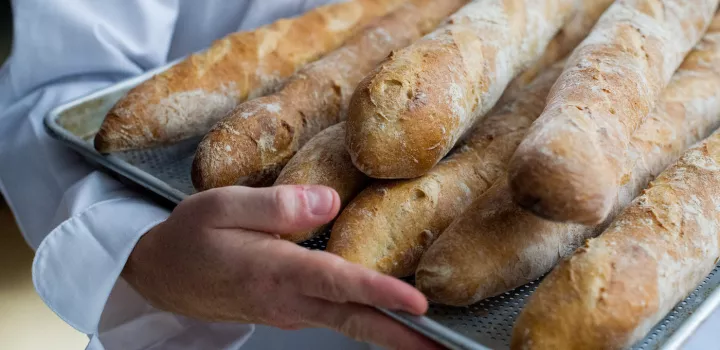 stack of french baguettes