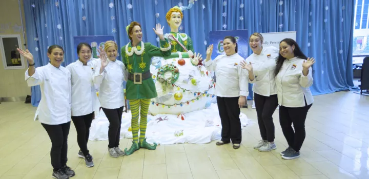 ICE pastry chefs in front of rice krispies buddy the elf